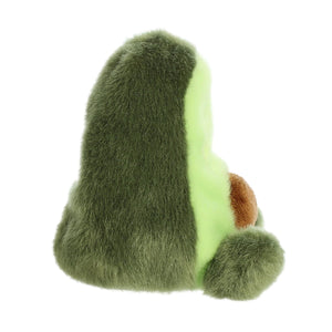 The Twice as Sweet Palm Pal Airy Avacado plush features soft green fabric, a light green face, and a brown pit patch—perfect for foodie plush collectors and shown in a side view.