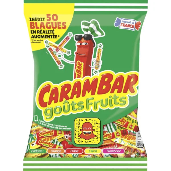 Carambar Fruits 320g (France) by Twice as Sweet: a colorful bag with a smiling cartoon candy, assorted chewy caramel and fruit flavors, French text about 50 jokes, and AR features.