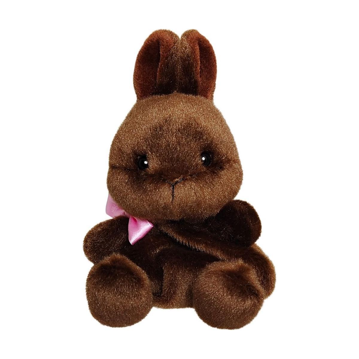 The Palm Pal Richie Chocolate Bunny by Twice as Sweet features chocolate brown plush fur and a pink ribbon, sitting upright on a white background—a cute stuffed animal perfect for any occasion.