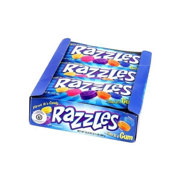 A display box of Twice as Sweet Concord Razzles Original 39g (USA) features blue packaging with colorful fruity candy pieces and the text: First its candy... then its chewy gum.
