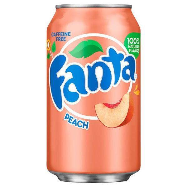 A 355mL can of Fanta Peach (USA) by Twice as Sweet, peach-colored with the Fanta logo, a peach slice image, and labels for Caffeine Free and 100% Natural Flavors.