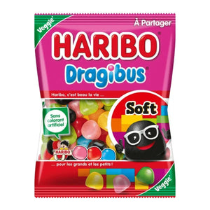 A colorful bag of Twice as Sweet Haribo Dragibus (France) fruity chewy candies with assorted bright pieces, featuring a smiling black candy character in sunglasses and French text on the packaging.