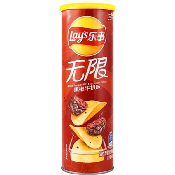 A 90g cylinder of Twice as Sweet Lays Black Pepper Rib Eye Steak Flavoured Chips (China) in red packaging, featuring steak chips and grilled steak images, labeled in Chinese as Rock Pepper Rib Eye Steak Flavor.