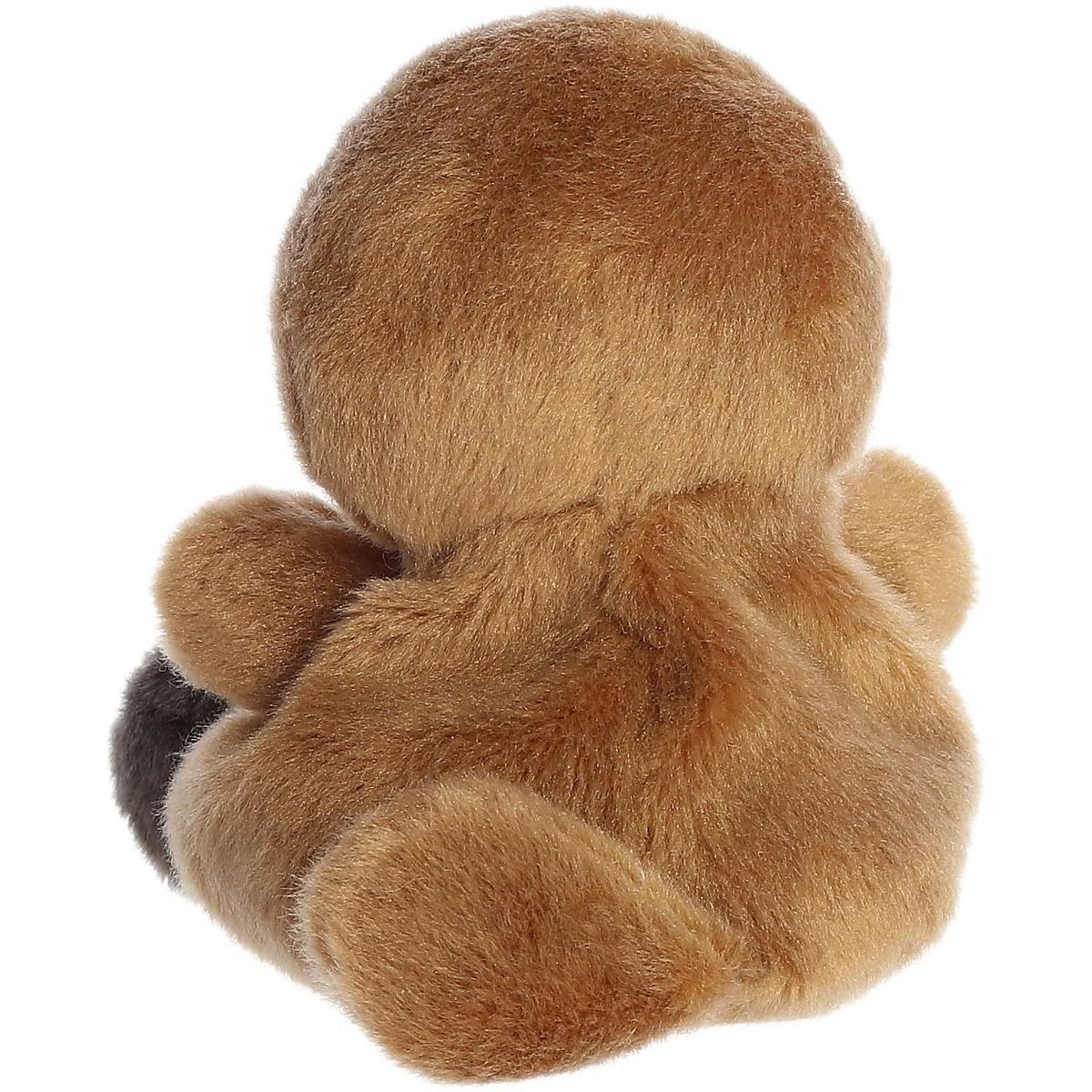 The Palm Pal Patty Platypus by Twice as Sweet is a brown, plush stuffed animal sitting with its back to the camera, showing its soft, fuzzy fur and rounded head, body, and limbs while its face and front remain hidden.