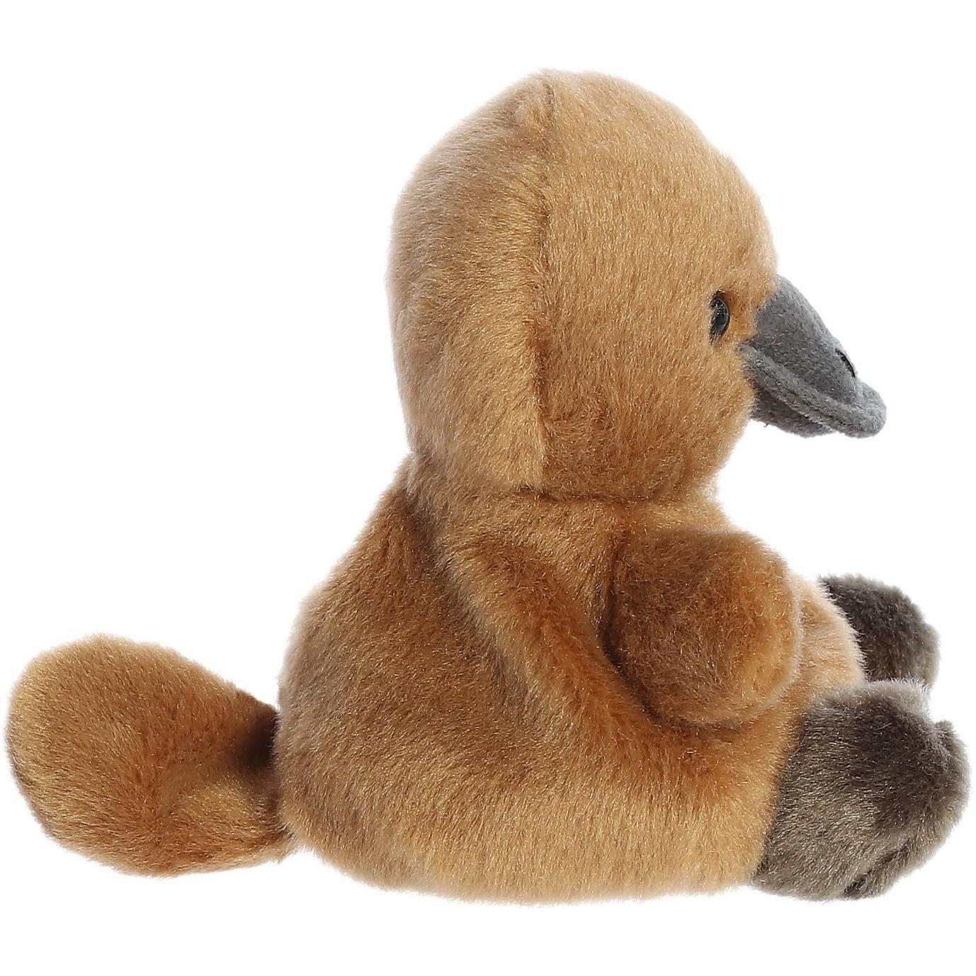 The Twice as Sweet Palm Pal Patty Platypus is a plush toy with a brown body, flat gray beak, small black eyes, and dark brown feet and tail—perfect for any forest animal plush collection.