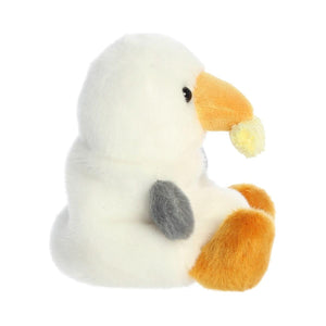 The Twice as Sweet Palm Pal Buoy Seagull with Fry is a plush white bird with an orange beak, grey wing, and orange feet—an adorable upright toy ideal for kids’ beach picnics.
