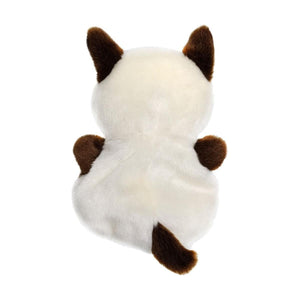 A Twice as Sweet Palm Pal Dusty Siamese Kitty plush is shown from the back, featuring soft white fur with dark brown ears, tail, and paws, against a plain white background.
