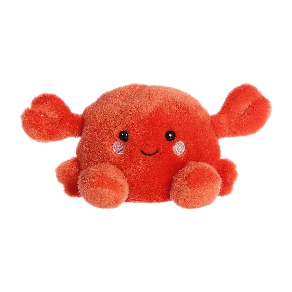 Palm Pal Snippy Crab by Twice as Sweet features a plush red body, round eyes, a smiling mouth, rosy cheeks, and fluffy claws—perfect decor for an aquatic party theme.