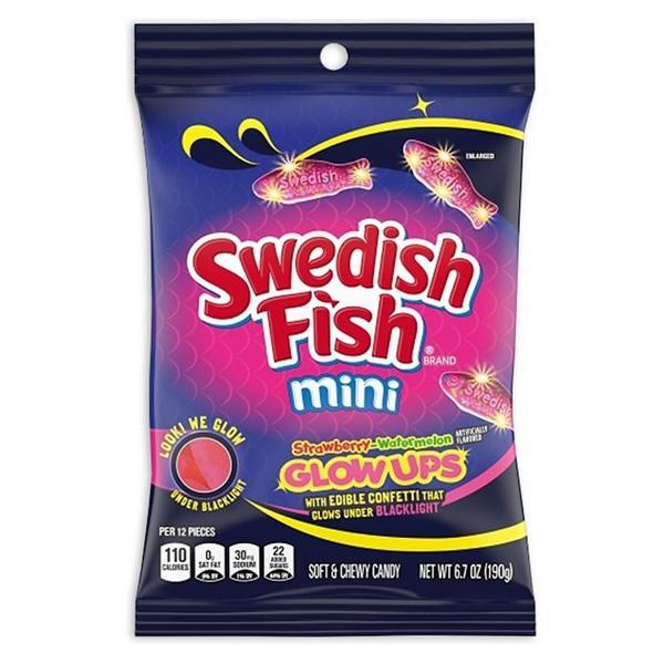 Twice as Sweet Swedish Fish Mini Glow Ups 102g (Canada) features strawberry watermelon candy with edible confetti that glows under blacklight. The dark package with bright accents makes for a fun, glow-in-the-dark candy experience.