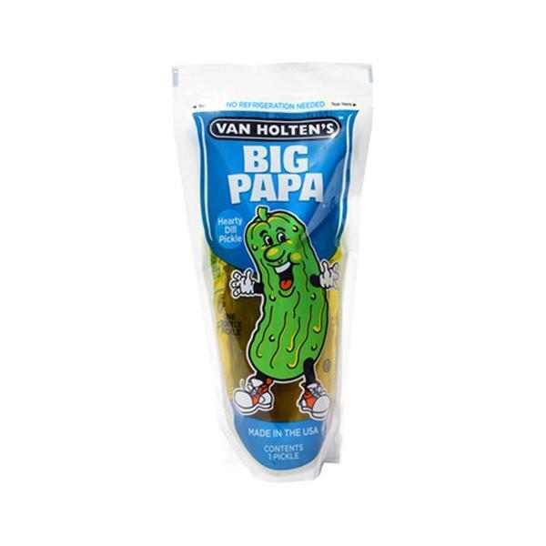A sealed package of Twice as Sweet Van Holtens Big Papa Pickle (USA) shows a smiling cartoon pickle with arms, legs, and sneakers. Bold blue and white packaging highlights this dill pickle snack with big, eye-catching text.